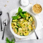 Zucchini, corn, tomatoes tossed with basil and pine nuts and served over pasta