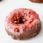 Close up of a baked strawberry donut