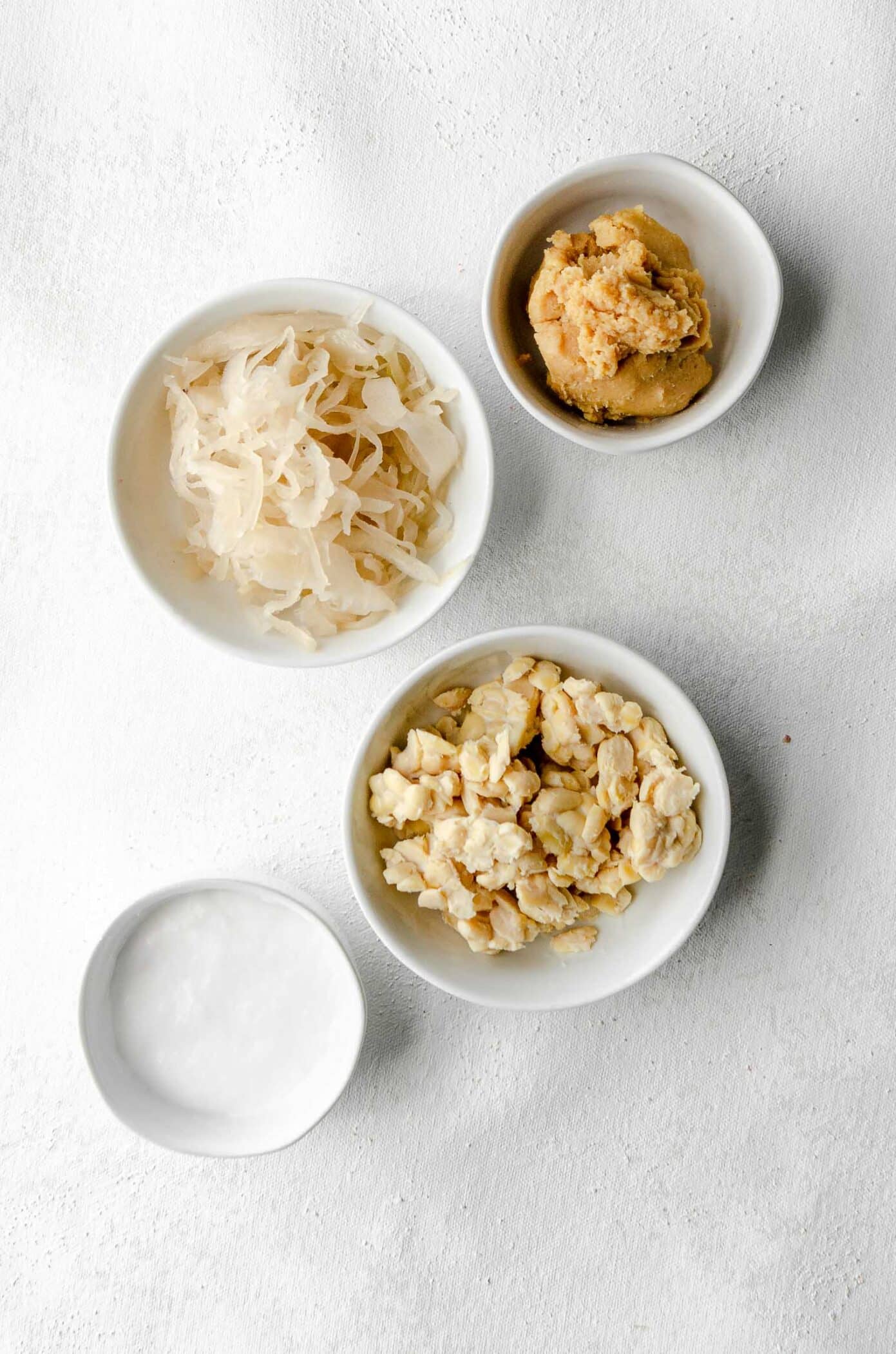 Examples of probiotic foods such as miso, sauerkraut, tempeh and yogurt